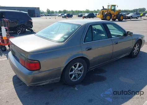 1999 Cadillac Seville Sts z USA, uszkodzony, nr VIN 1G6KY5494XU934143